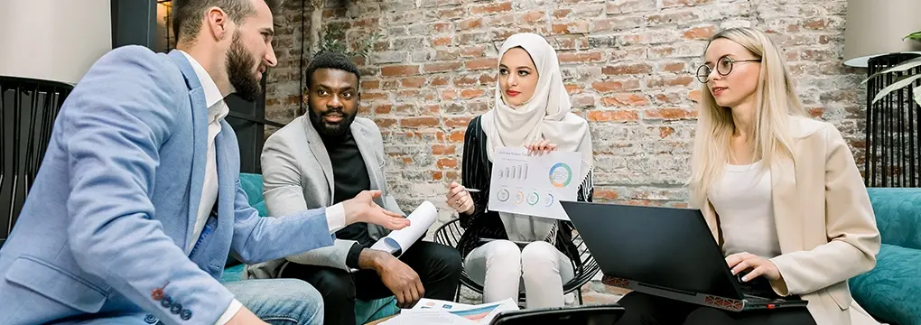 Group of people sitting together working