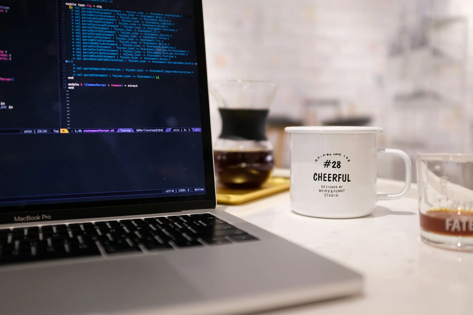 Image of laptop with website code performing an accessibility audit