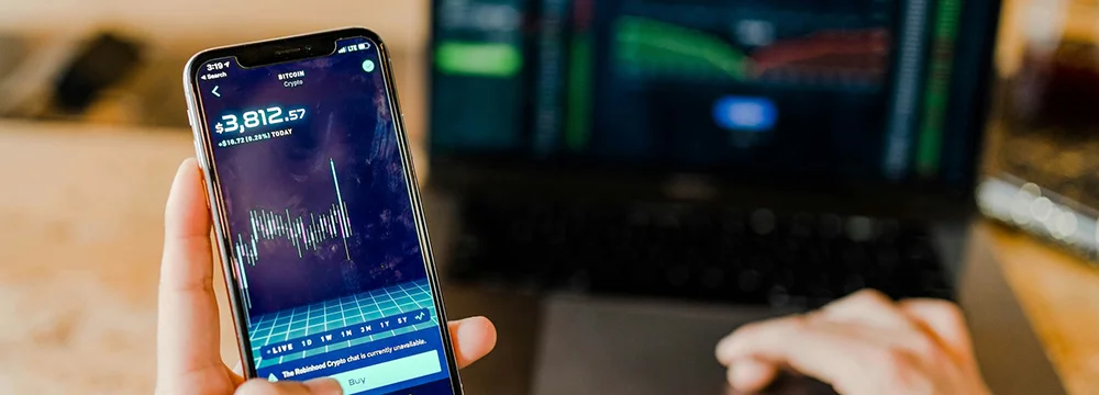 User with mobile application exploring charts