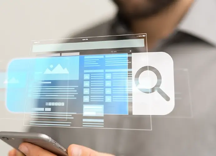 Image of man using a phone and navigating digital solutions.